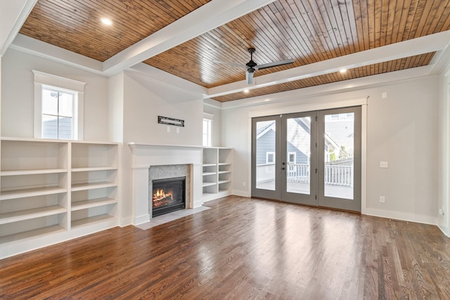 unfurnished living room featuring french doors, ceiling fan, wood-type flooring, built in features, and wooden ceiling