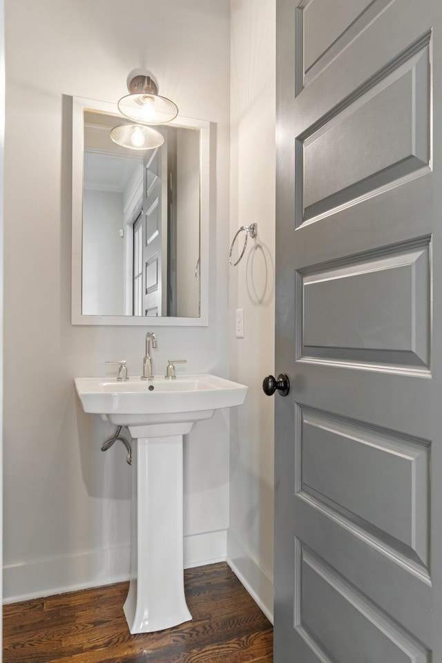 bathroom with wood-type flooring