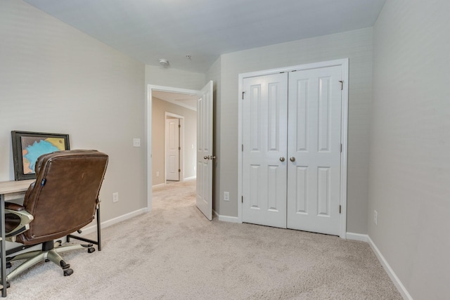 home office with light colored carpet