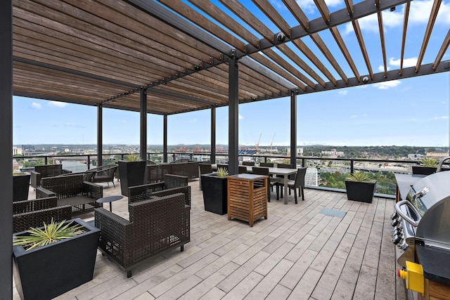 wooden terrace featuring an outdoor hangout area, a pergola, and grilling area