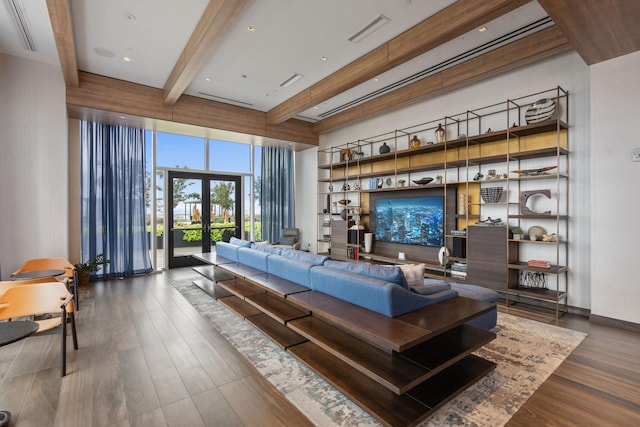 living room featuring french doors, dark hardwood / wood-style flooring, and beam ceiling