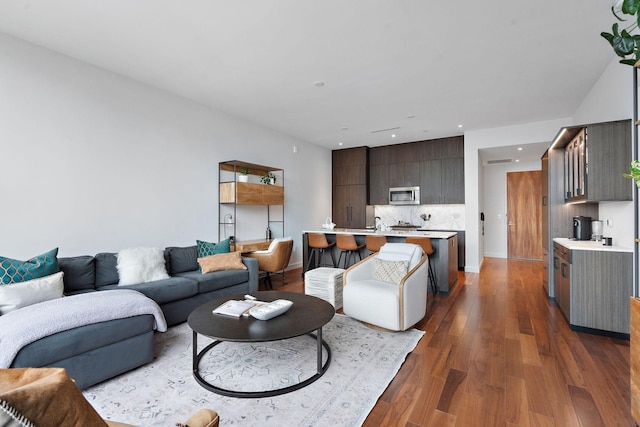 living room with dark wood-type flooring