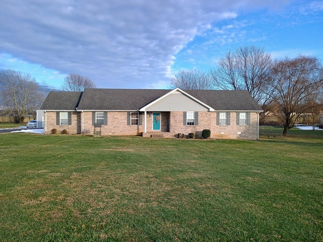 ranch-style home with a front yard