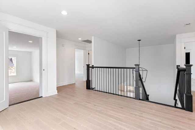 spare room featuring light wood-type flooring