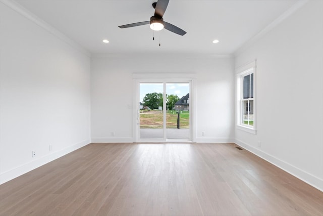 unfurnished room with ceiling fan, light hardwood / wood-style floors, and ornamental molding