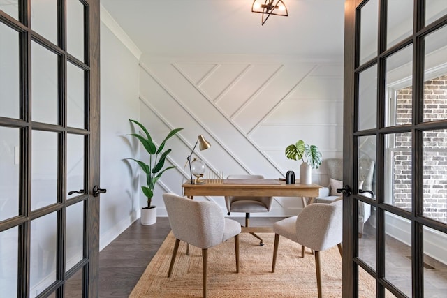 office with dark hardwood / wood-style flooring and ornamental molding