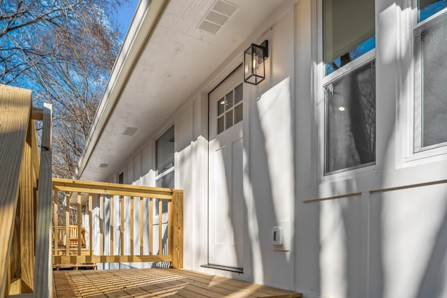 view of home's exterior featuring a wooden deck