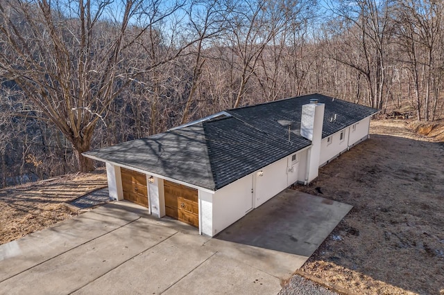 exterior space with a garage