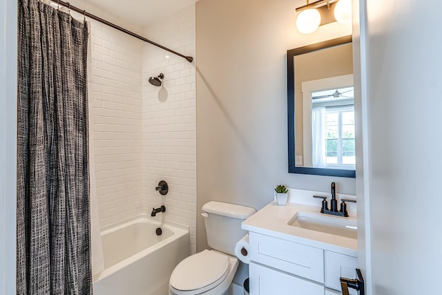 full bathroom with shower / bath combo, vanity, and toilet