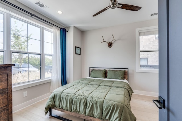 bedroom featuring ceiling fan and light wood-type flooring