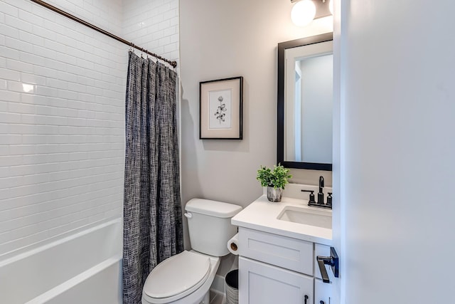 full bathroom with toilet, vanity, and shower / tub combo with curtain