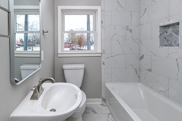 bathroom with sink and toilet