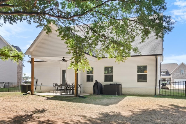 back of property with ceiling fan, a patio, and central air condition unit