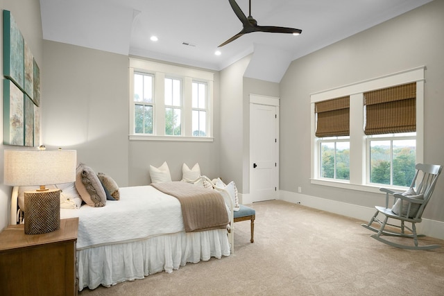 carpeted bedroom with lofted ceiling and ceiling fan