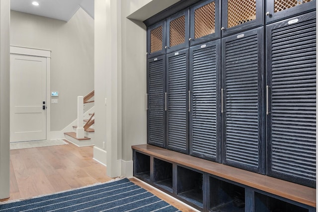 mudroom with hardwood / wood-style floors