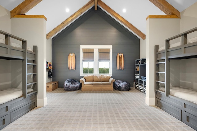 living room featuring high vaulted ceiling, beam ceiling, and light carpet