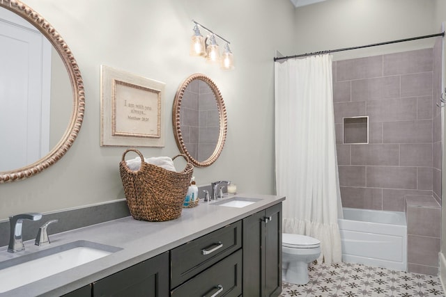 full bathroom featuring toilet, shower / tub combo, and vanity