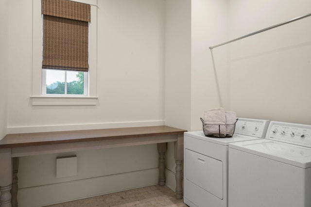 washroom featuring washer and clothes dryer