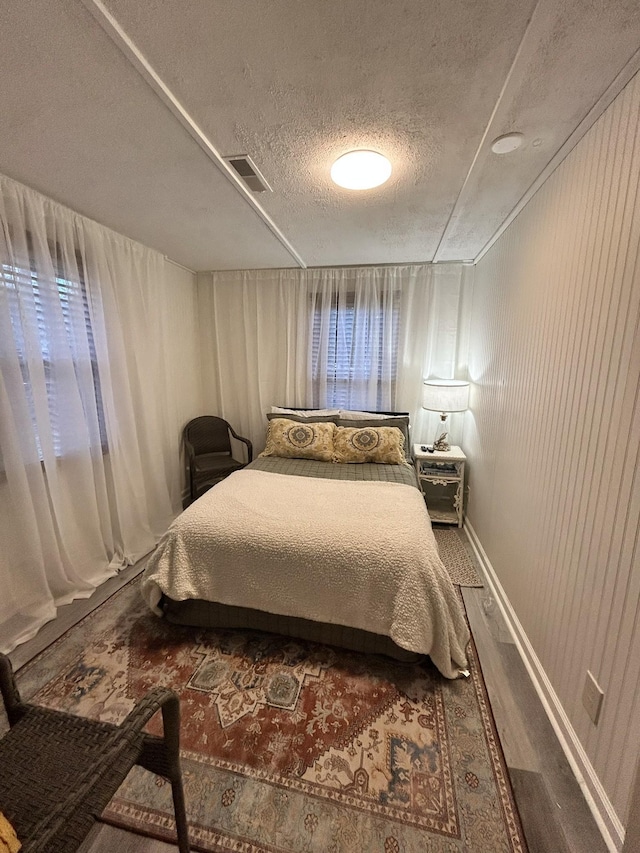 bedroom featuring a textured ceiling