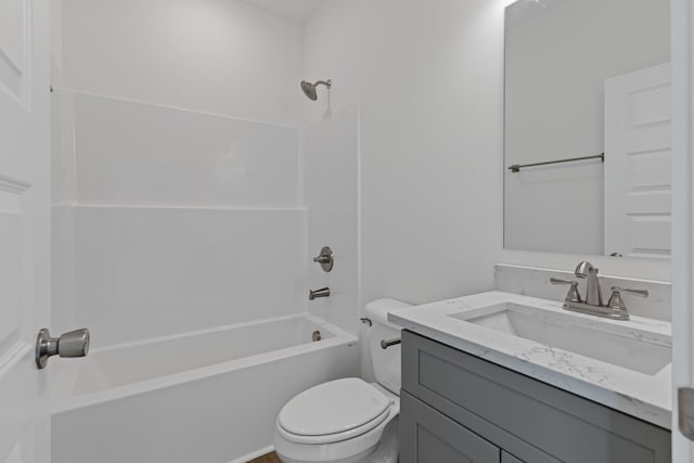 full bathroom featuring toilet, bathtub / shower combination, and vanity