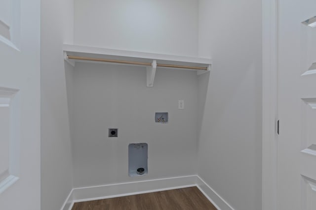 laundry area featuring dark hardwood / wood-style floors, hookup for an electric dryer, and hookup for a washing machine