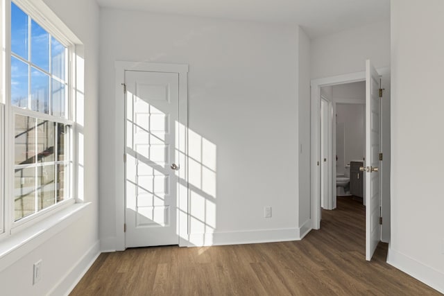 interior space with dark hardwood / wood-style floors