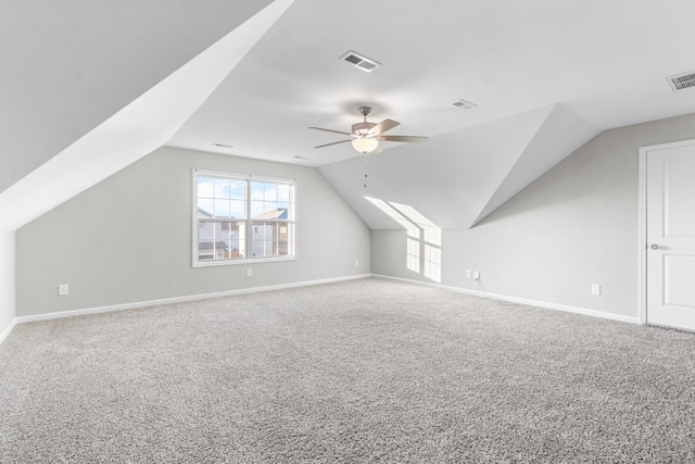 bonus room featuring ceiling fan, lofted ceiling, and carpet flooring