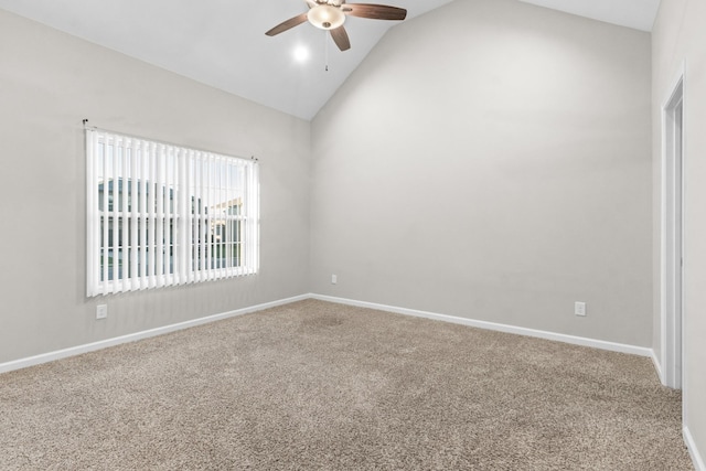 unfurnished room with lofted ceiling, carpet floors, and ceiling fan