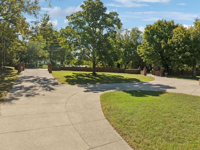 view of home's community featuring a lawn