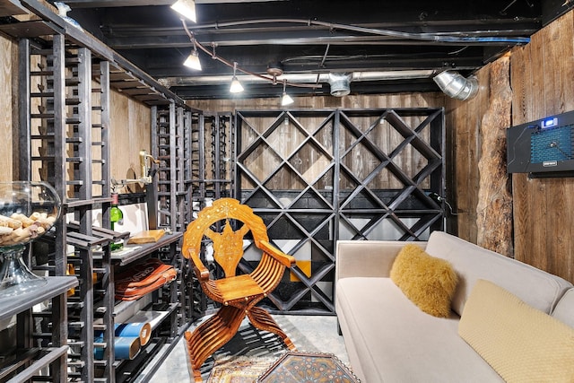 wine cellar featuring concrete flooring