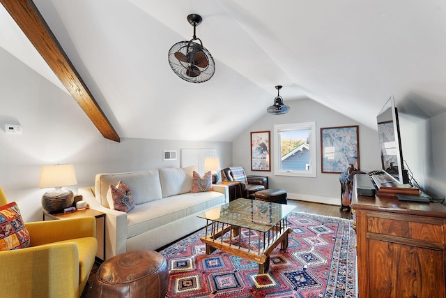 living room with hardwood / wood-style flooring and vaulted ceiling