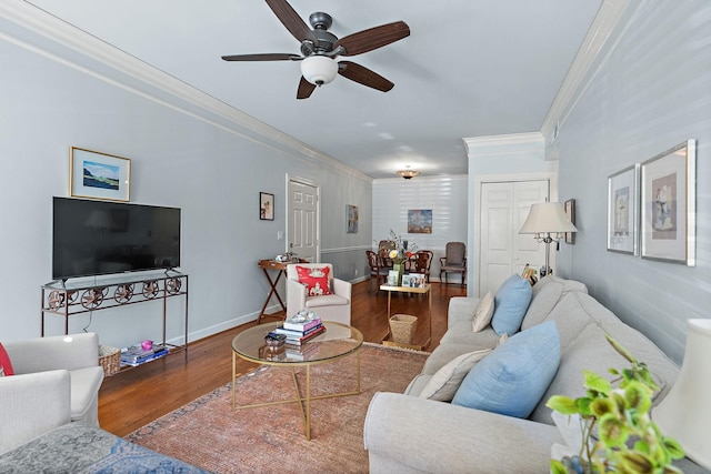 living room featuring ceiling fan, crown molding, and hardwood / wood-style floors