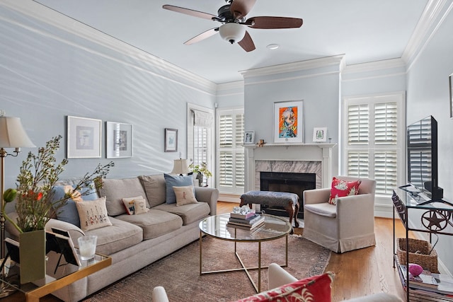 404 Sloan Rd, Nashville, TN 37209 - living room with a high end fireplace, ceiling fan, ornamental molding, and hardwood / wood-style flooring