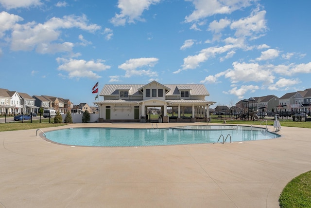 view of swimming pool featuring a patio