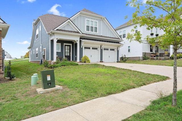 view of front of home with a garage and a front yard