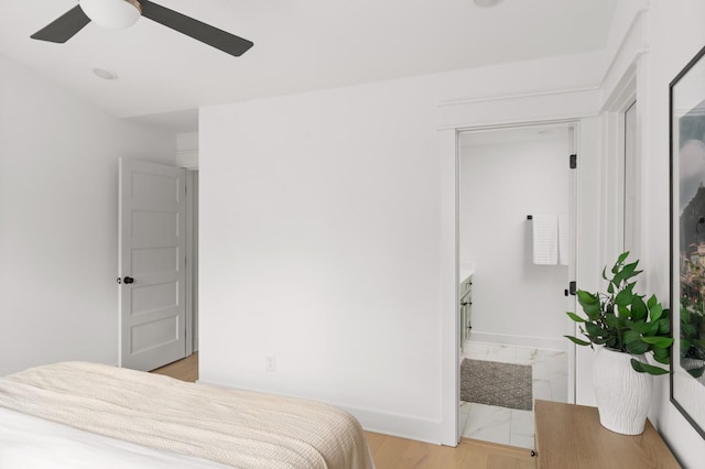 bedroom with ceiling fan and light wood-type flooring