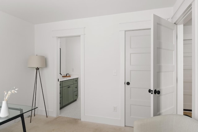 bedroom featuring light carpet