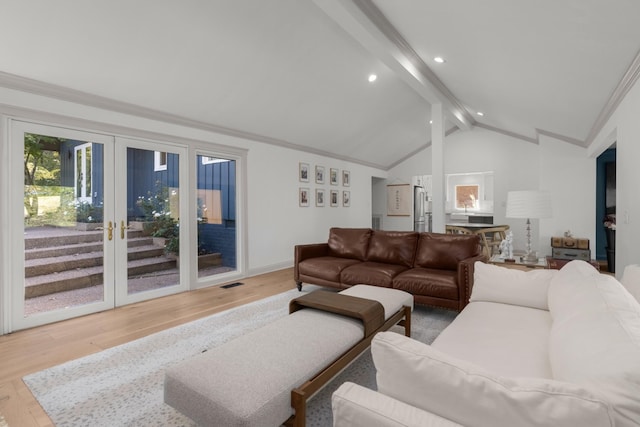 living room with french doors, crown molding, wood-type flooring, and vaulted ceiling with beams