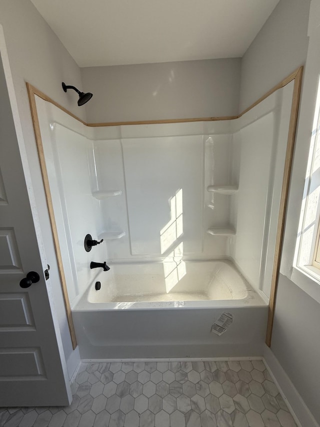 bathroom featuring tile patterned floors and shower / bath combination