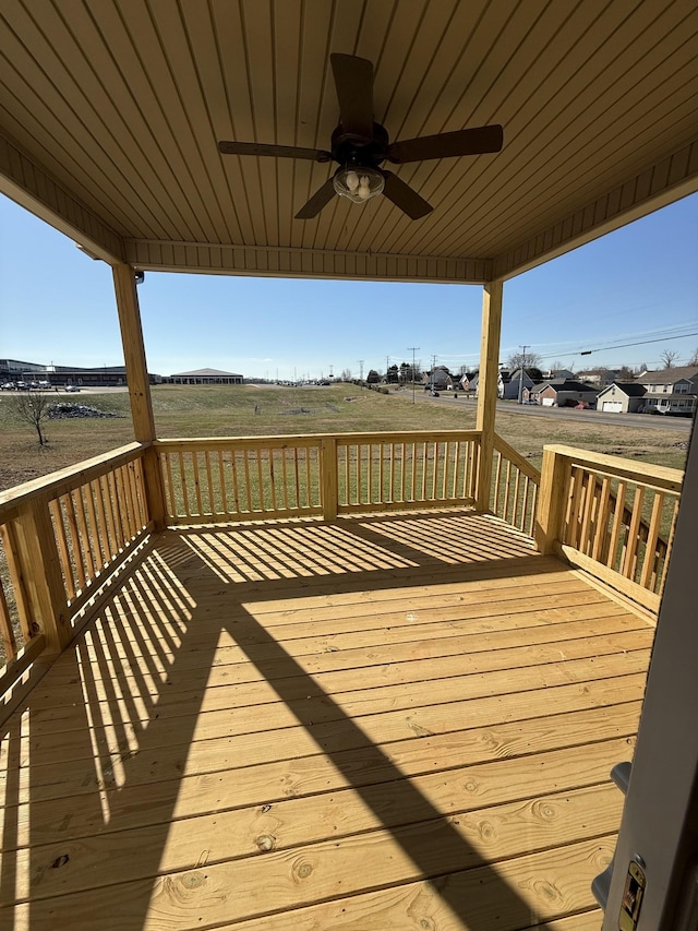 wooden terrace with ceiling fan