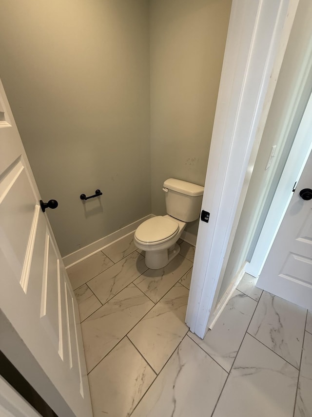 bathroom featuring toilet