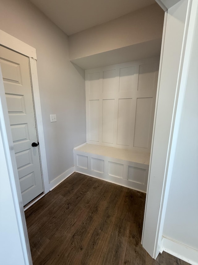 mudroom with dark hardwood / wood-style floors