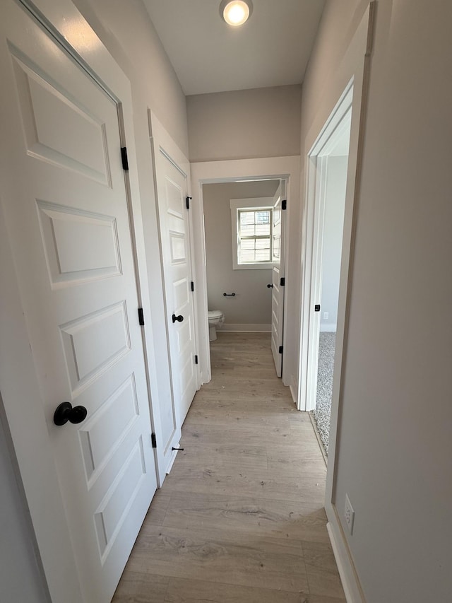 hallway featuring light hardwood / wood-style floors