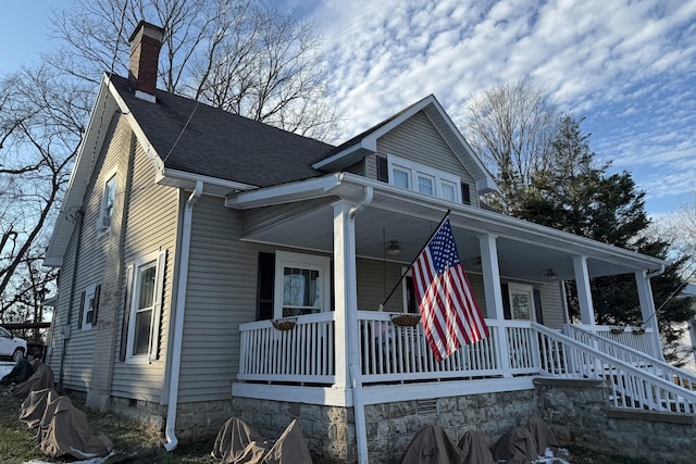 view of front of home featuring covered porch