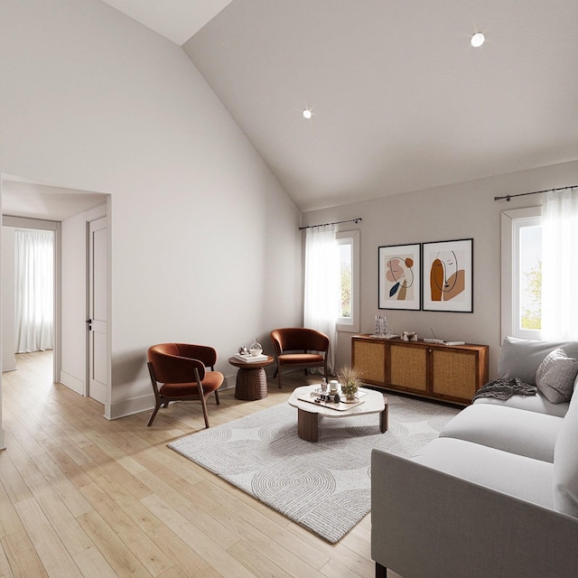 living room with lofted ceiling and light wood-type flooring