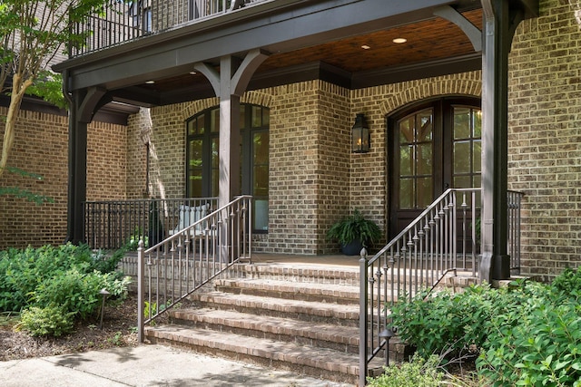 view of exterior entry featuring french doors