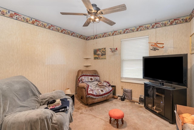 living room with light carpet and ceiling fan