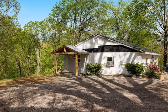 view of front of property featuring cooling unit