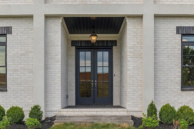 entrance to property featuring french doors