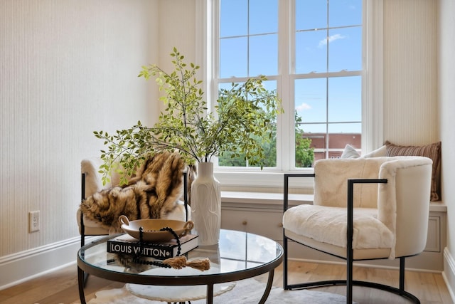 sitting room with light wood-type flooring